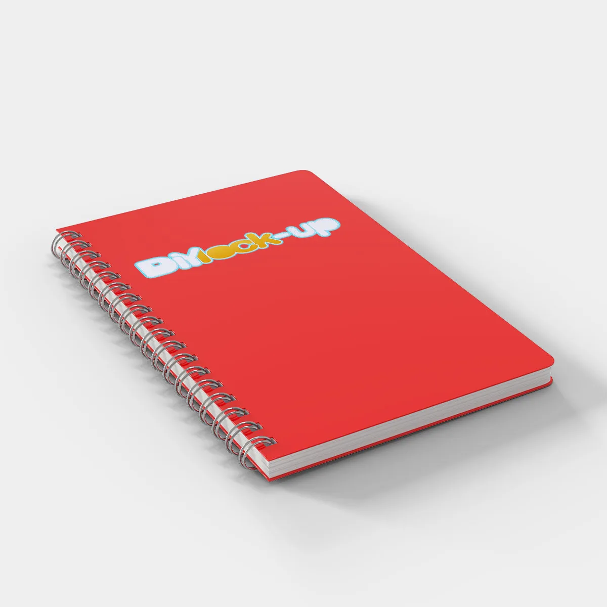 red notebook at a diagonal angle